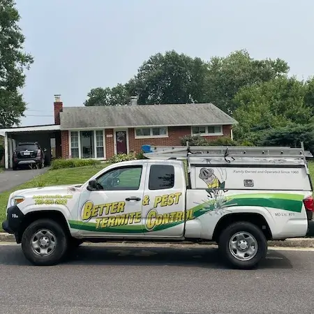 Better Termite service truck driving through neighborhood